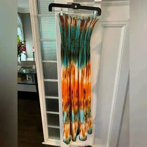 Steven Madden strapless full length dress. Tie dye, stretch top and ruffle hem.